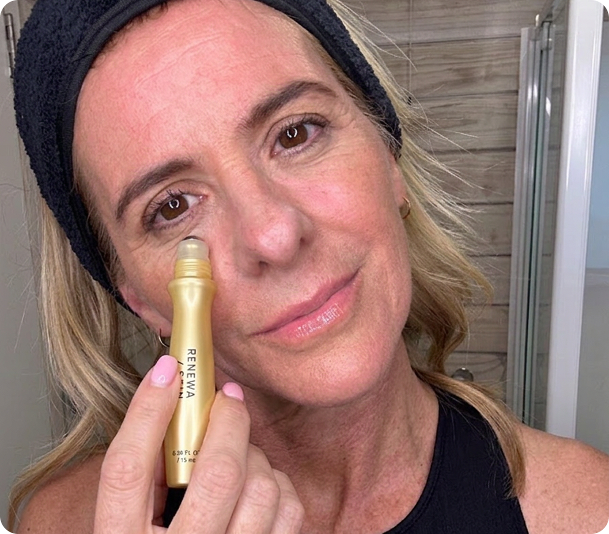Woman using the RenewaLift skincare device
