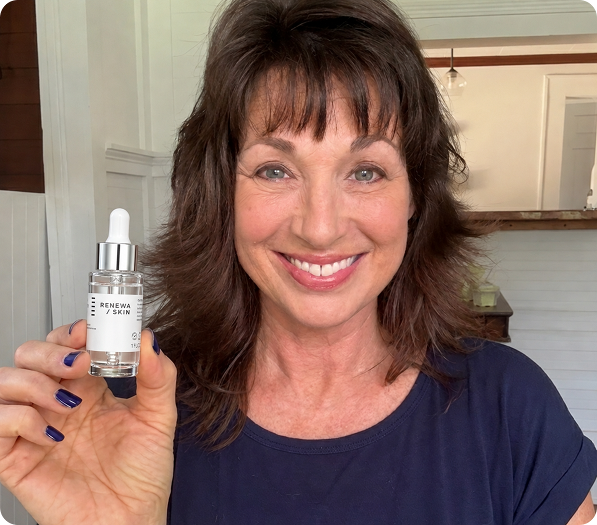 Woman using the RenewaLift skincare device